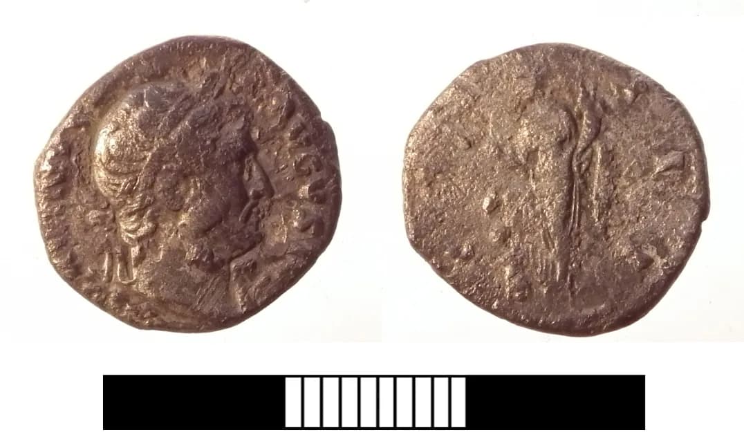 Obverse and reverse of a silver denarius of Hadrian, showing the emperor's portrait and a standing figure of Abundantia.